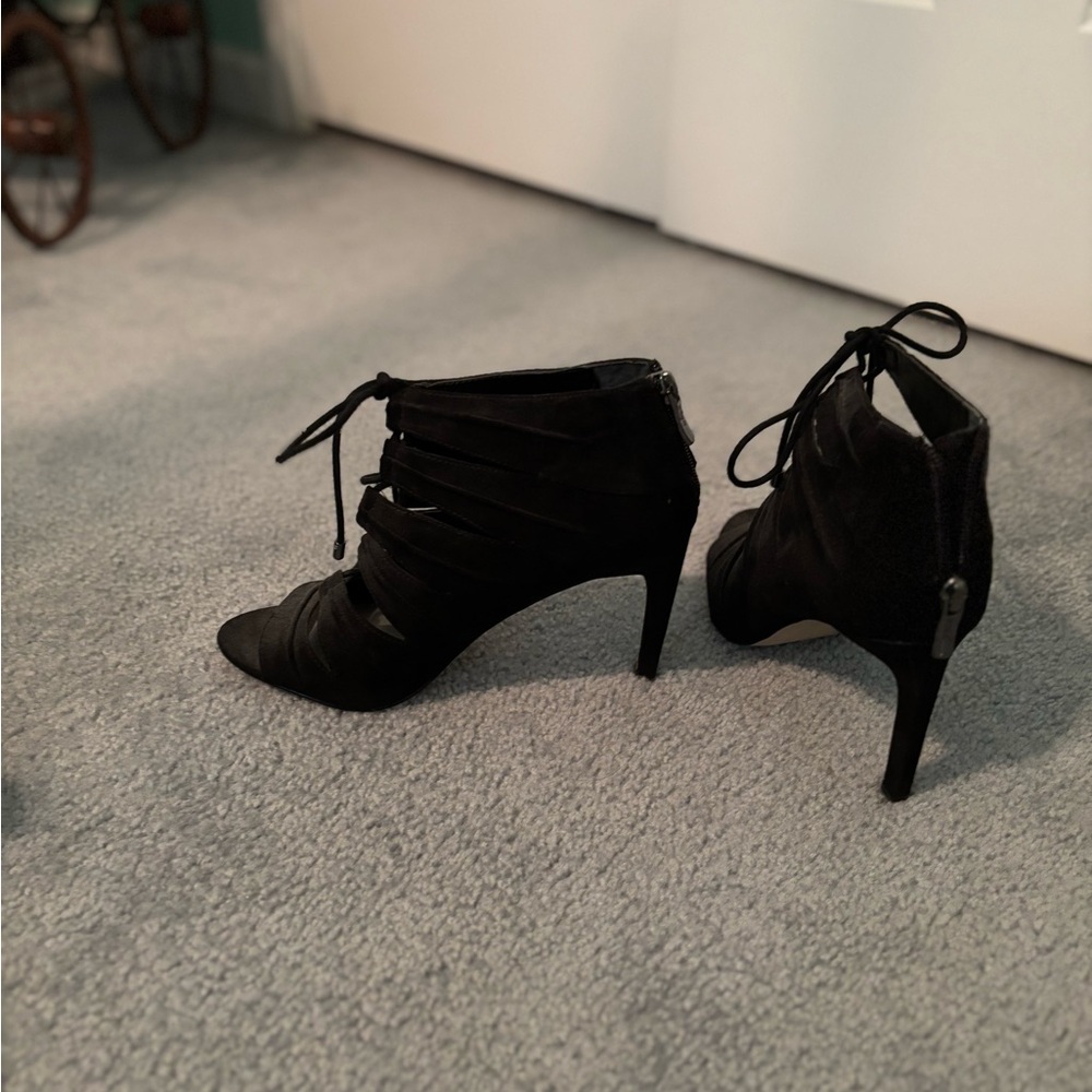 BCBGeneration Black Lace-Up Heels with Stiletto Design